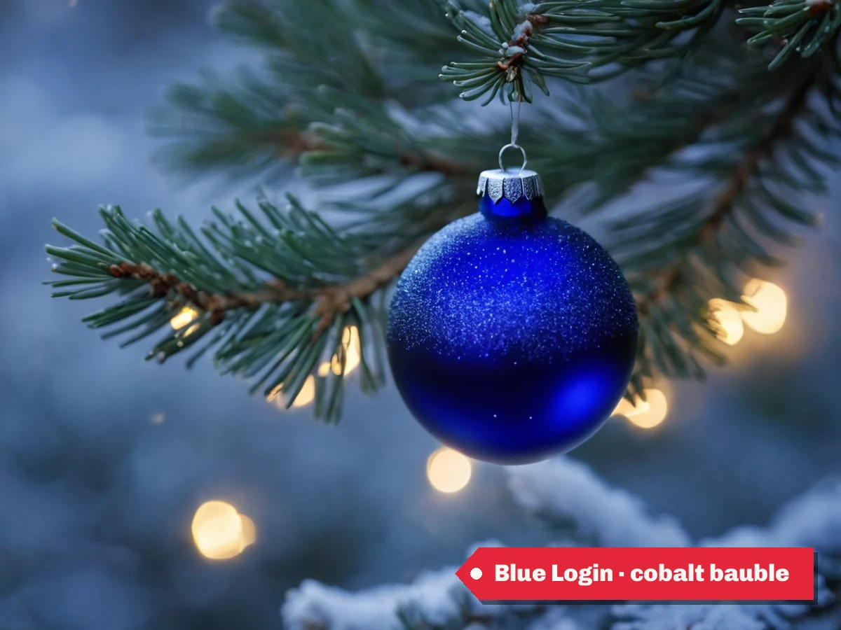 Blue Login · cobalt bauble — a cobalt ornament on a frosted pine branch